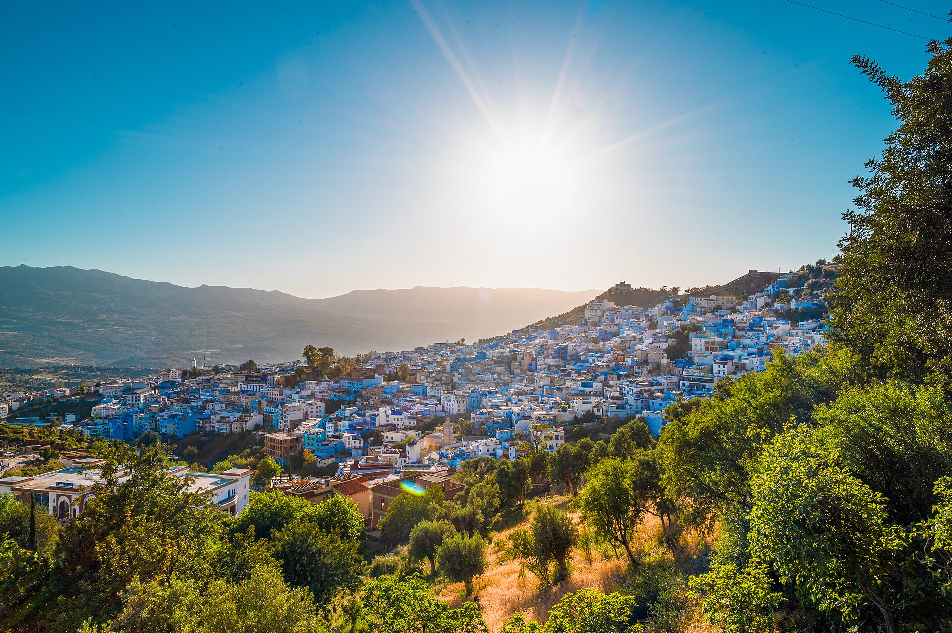 Chefchaouen at sunset with the Rif mountains behind
