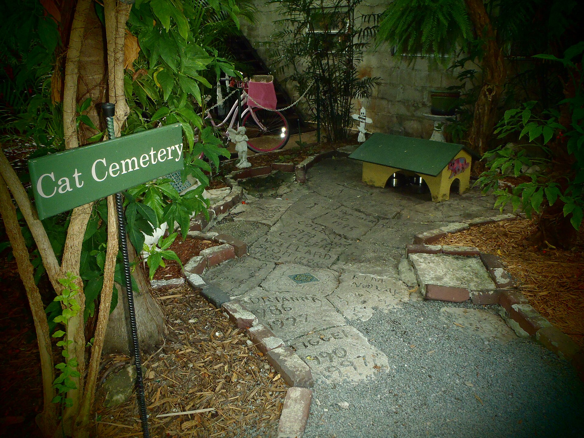 Small headstones in the cat cemetery in the garden of the Hemingway House