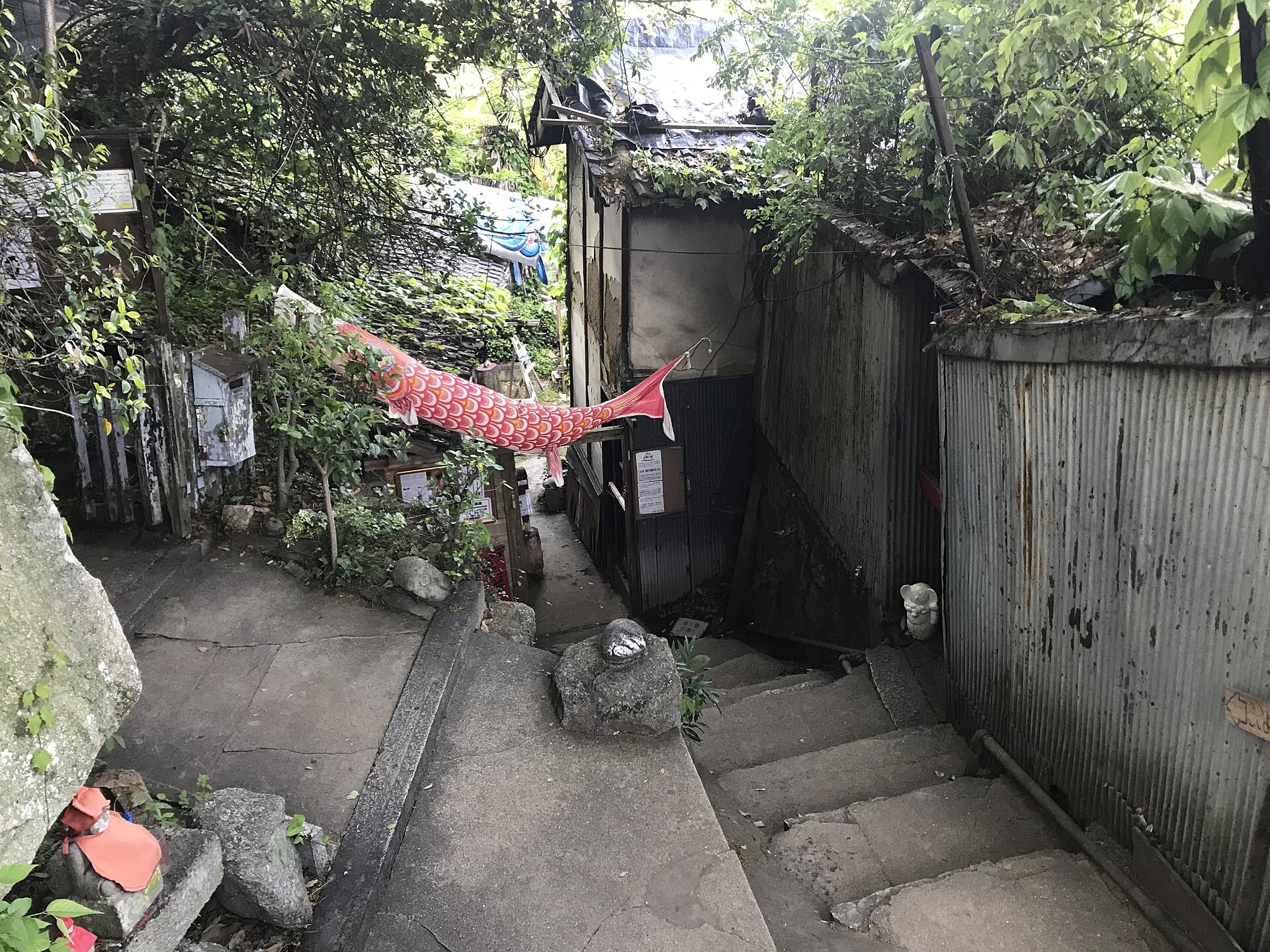 The Narrow Path of Cats in Onomichi, a stepped lane between old wooden houses