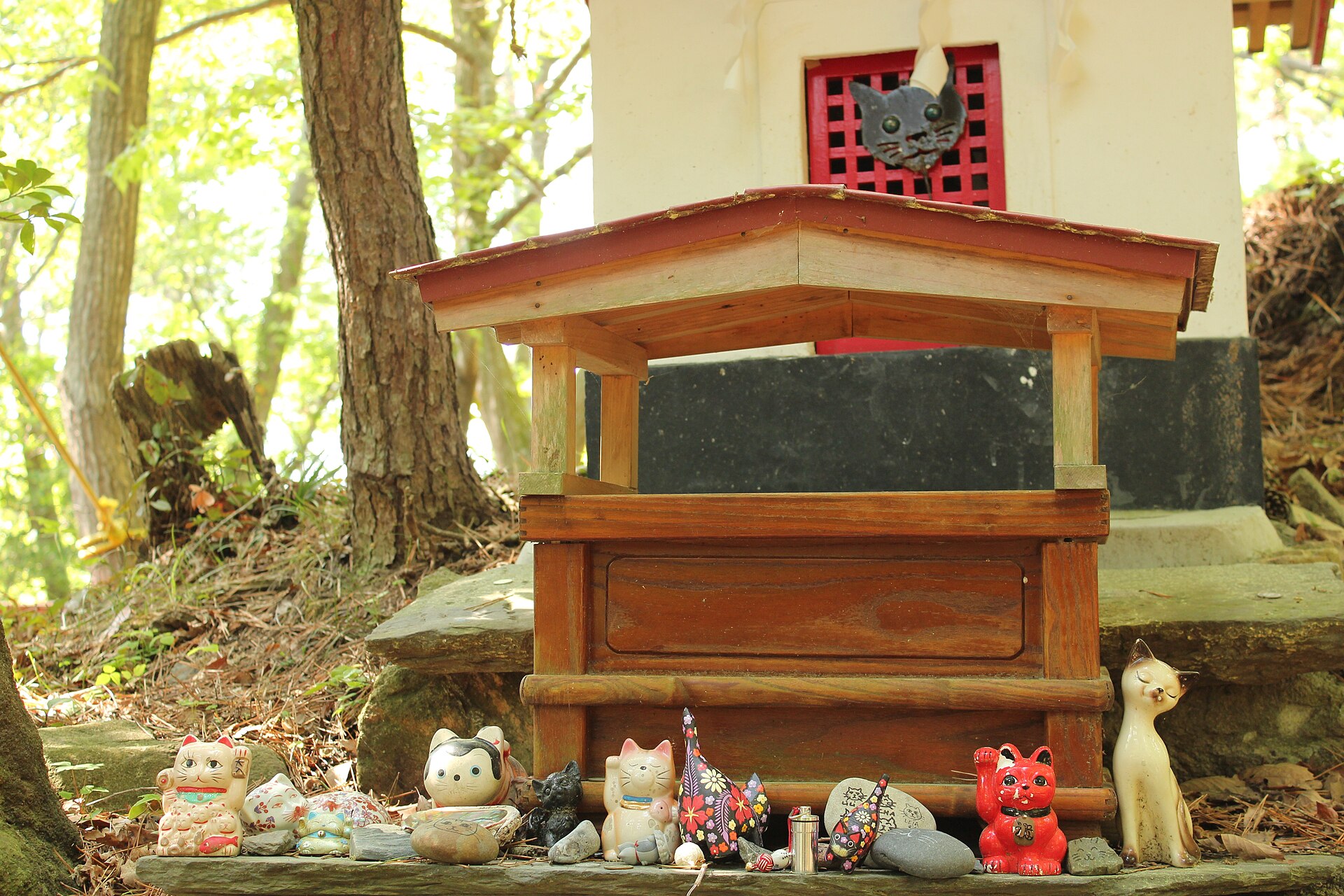 The cat shrine on Tashirojima with figures of cats left as offerings