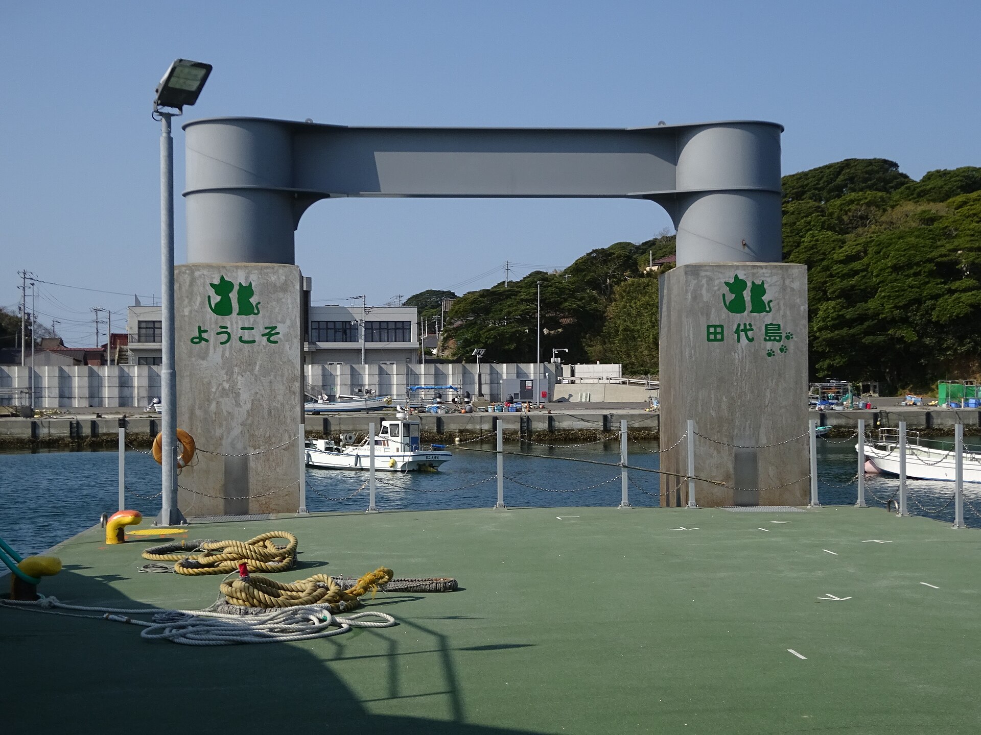 The small ferry port on Tashirojima, boats tied up at the concrete quay